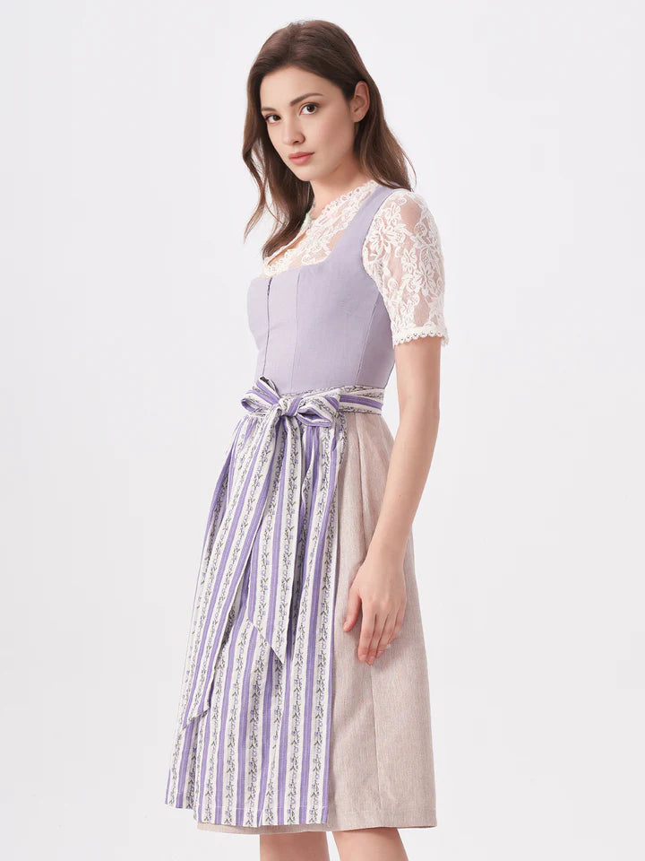 De fascinatie van de dirndl: rits, gele en lila -kleuren