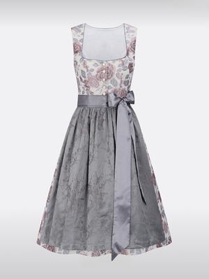 Die Dirndl mit vorne liegendem Reißverschluss und hohem Bund: Ein Modephanomen zwischen Tradition und Moderne