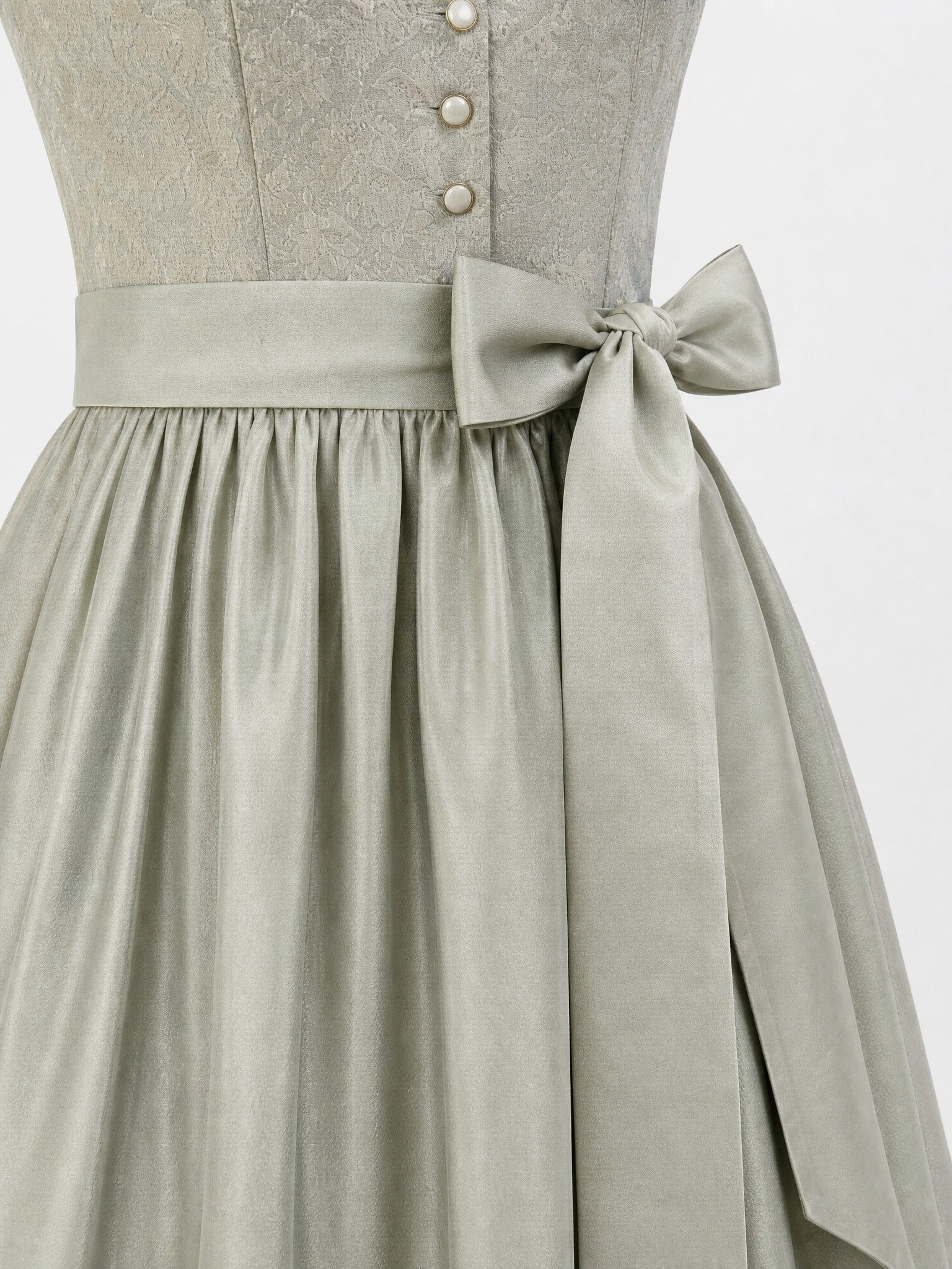 Dirndl Lotta in Flechtengrau mit Salbeigrün Schürze - Detailansicht Taille und Schleife
