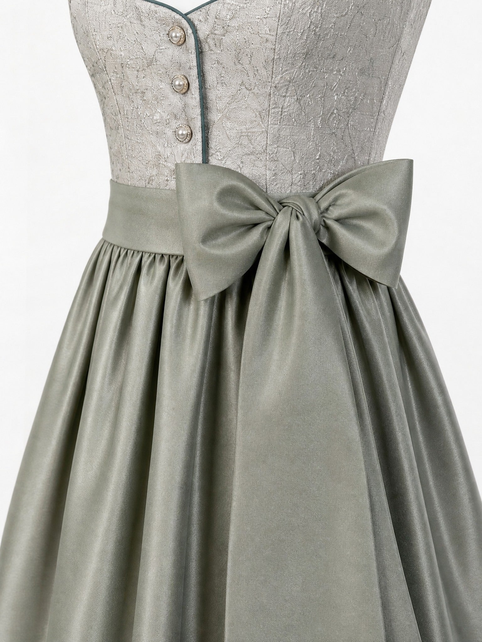 Dirndl Antonia in Flechtengrau mit Salbeigrün Schürze - Detailansicht Taille und Schleife